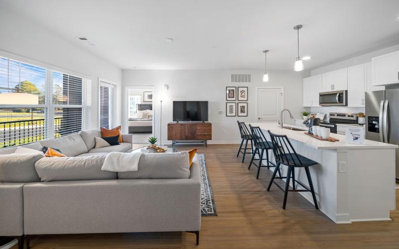 Gorgeous living areas to entertain and enjoy a living room with a couch and a table
